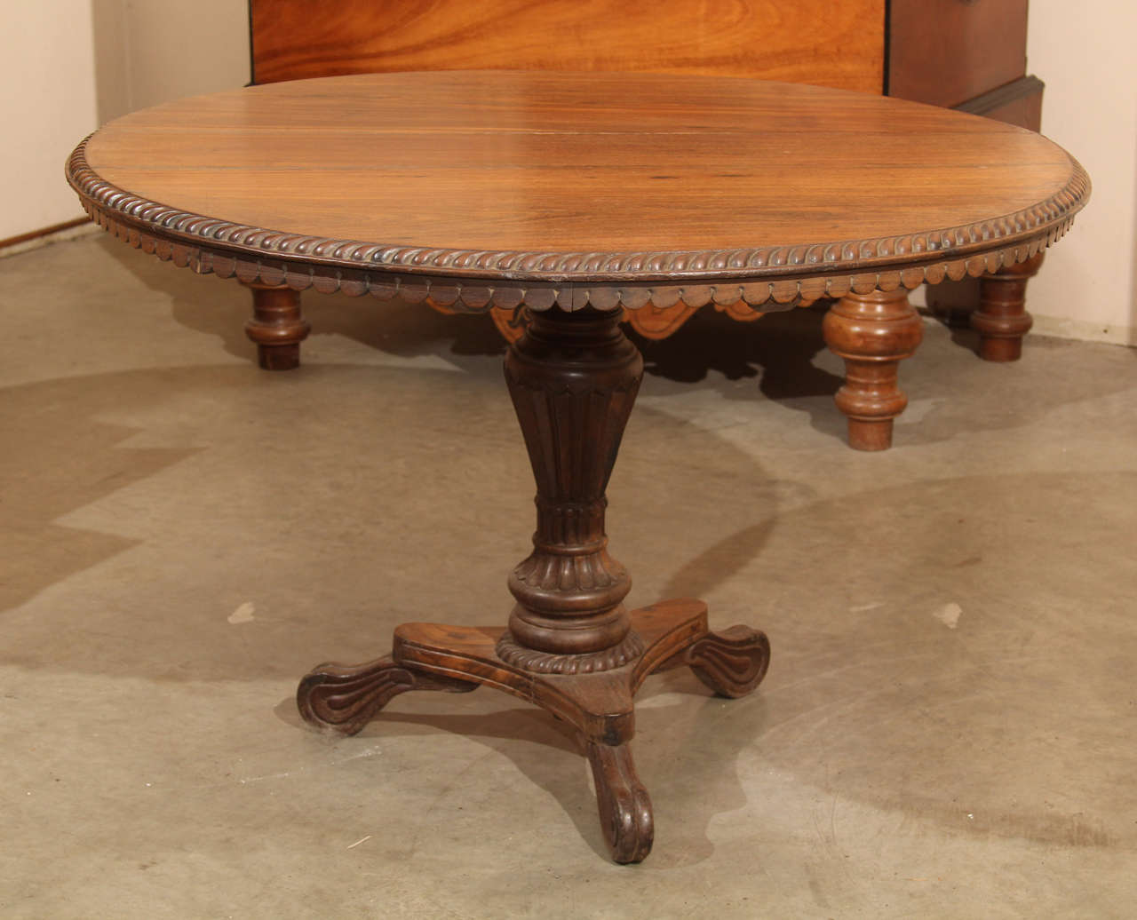 A Ceylonese round paldao wood tilt-top on tripod base in the Dutch colonial taste, circa 1850.