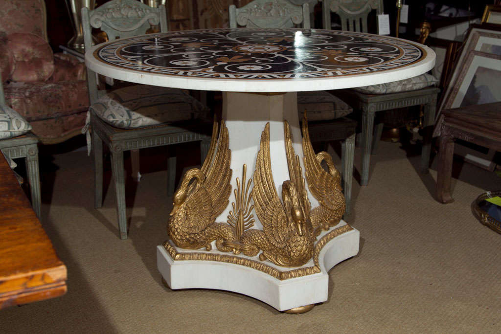 Offered here is a wonderful 'Pietra Dura' center hall table made of marble.  The top is Pietra Dura, a technique of using cut and fitted, highly-polished colored stones to create images, patterns and shapes.
