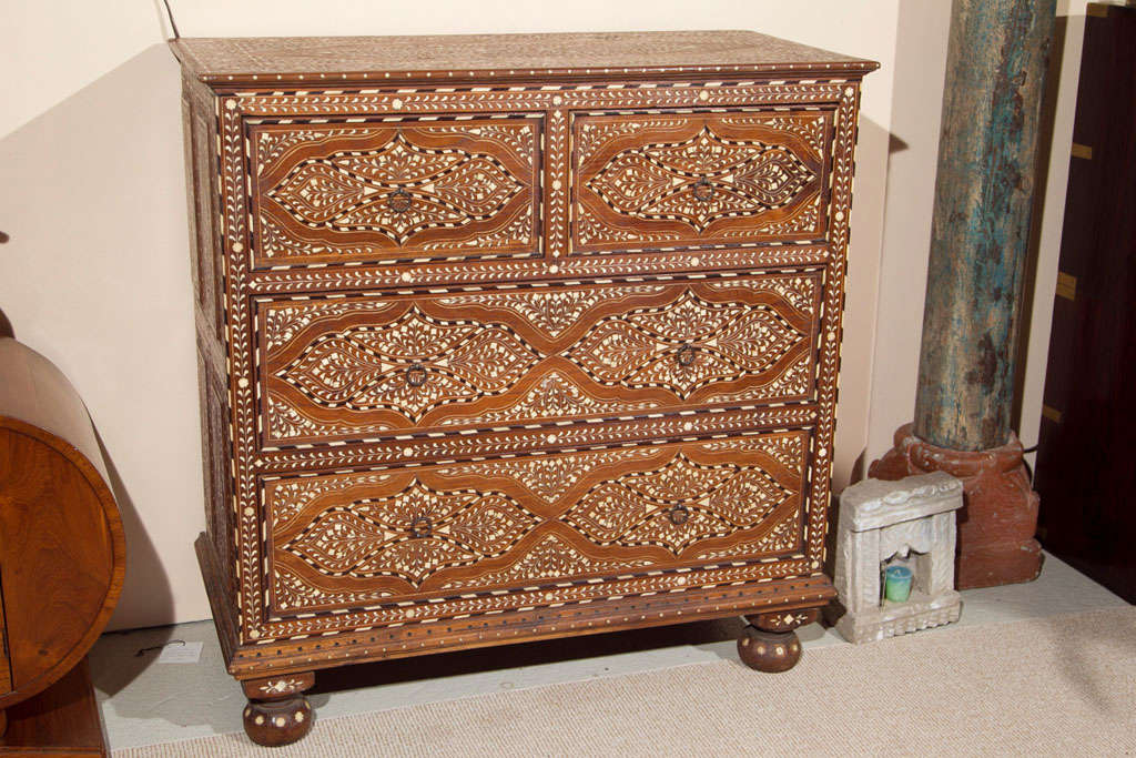 Early 1900's Chest of Drawers with incredible hand worked inlay-intricate and small pieces of inlay add to all its value.  One of the best examples we've ever had.
