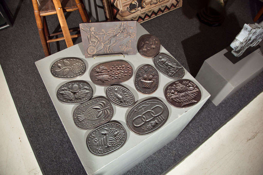 These twelve (12) charming cookie molds of various sizes each boast of a unique theme: harvest, religion, celebration, and holiday spirit, to name a few.  Use them decoratively or practically in your home!