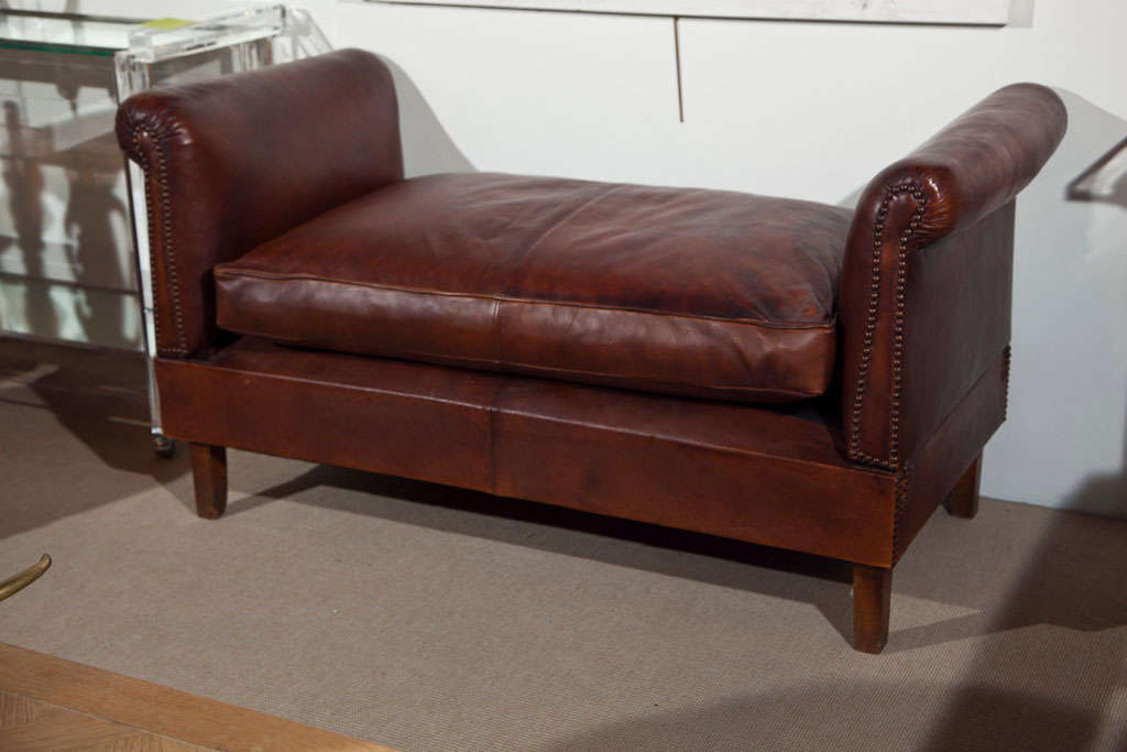 Vintage Meridienne from Paris, France adjustable sides and fold down for reclining. Leather with nail heads.