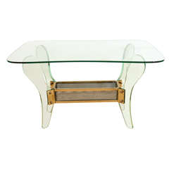 A Maison Brusotti Glass and Brass Coffee Table.