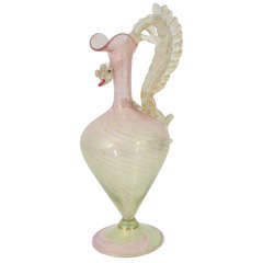 Antique An art nouveau Venetian glass pitcher with a dragon handle.