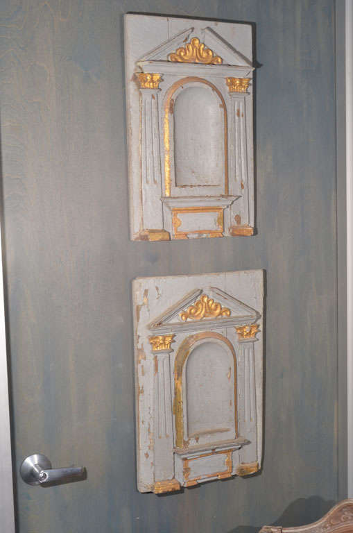 Pair of late Renaissance panels from an altar piece. Original gilt and paint.