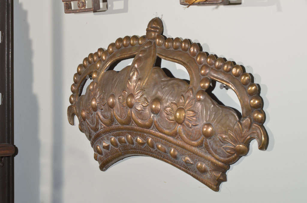 19th century bronze crown mold with intricate detail.