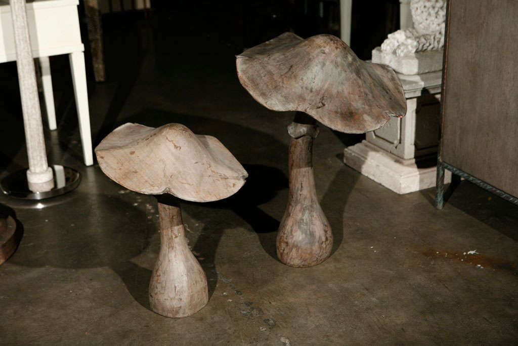 Pair of hand made poplar wood mushrooms.
