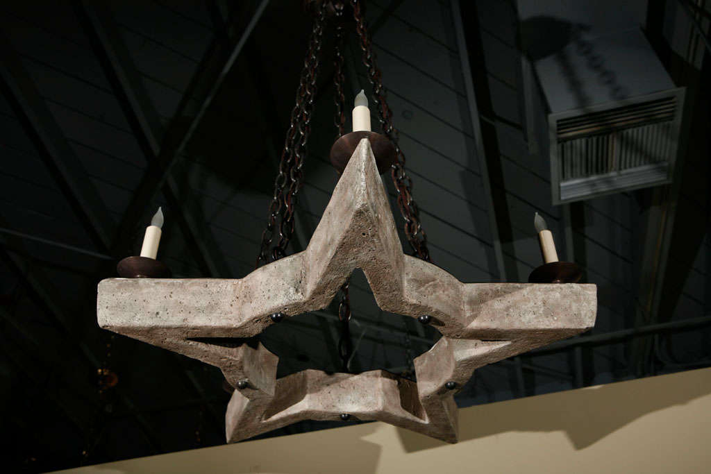 Paul Marra Star chandelier shown in distressed finish and oil rubbed bronze. One remaining.