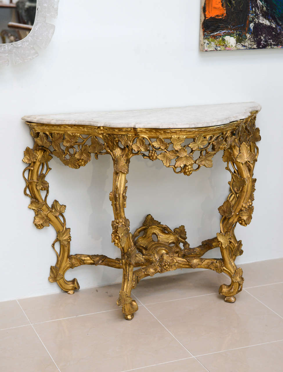An Italian Rococo Giltwood and Marble Top Console, Rome