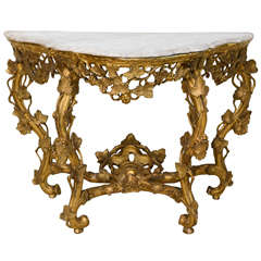 An Italian Rococo Giltwood and Marble Top Console, Rome