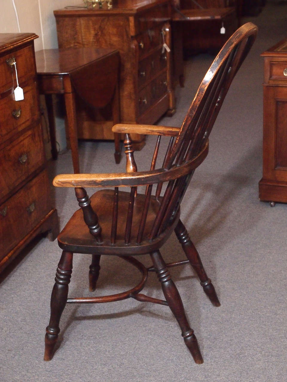 Elm Antique English elm and ash Windsor chair with crinoline stretcher.