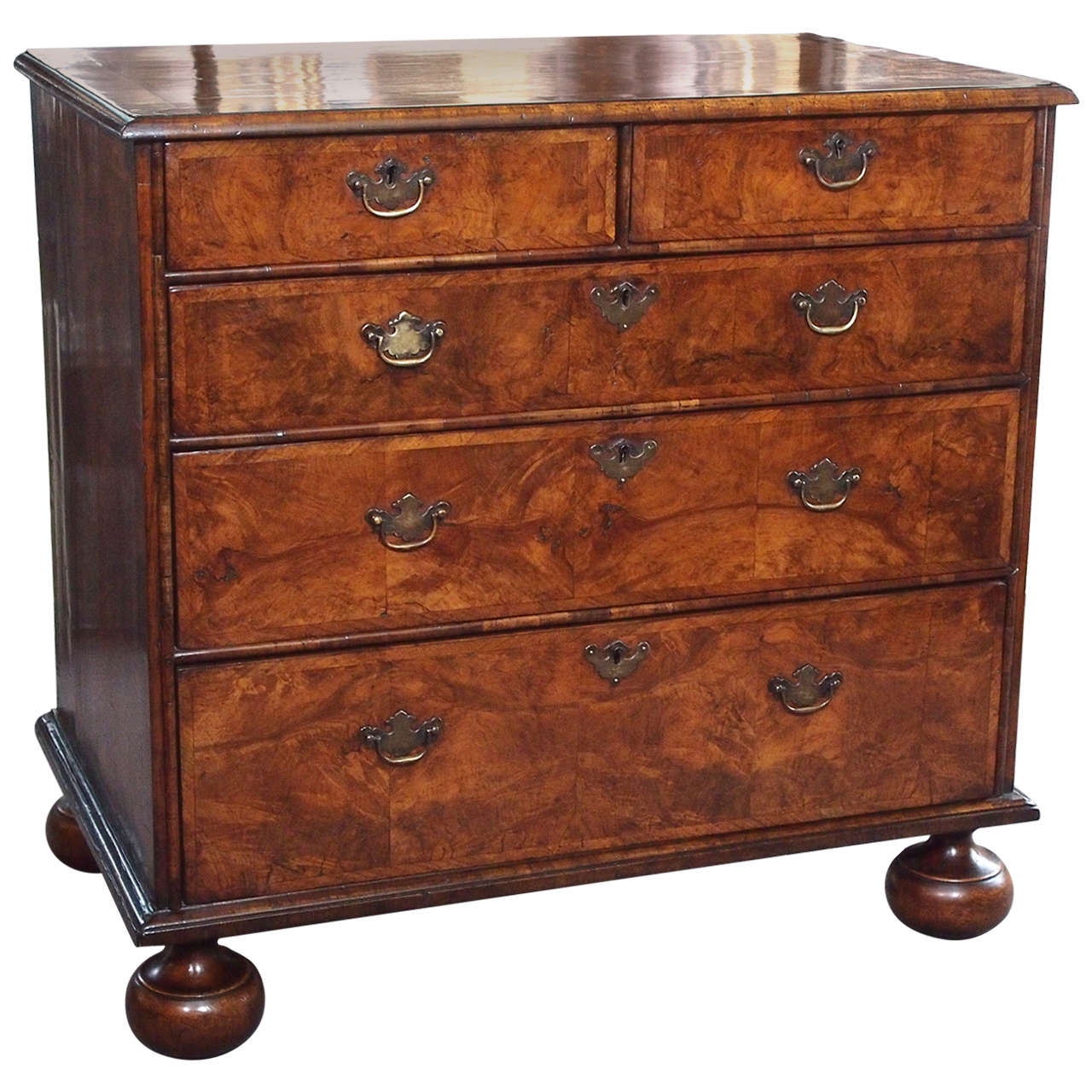 Rare William and Mary walnut chest of 5drawers crossbanded on bun