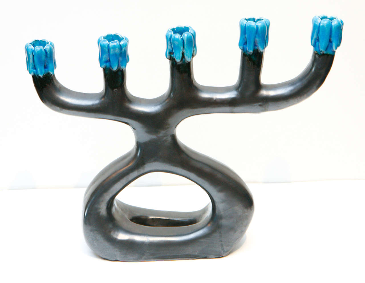 Uniquely shaped five-light Chinese candelabra.