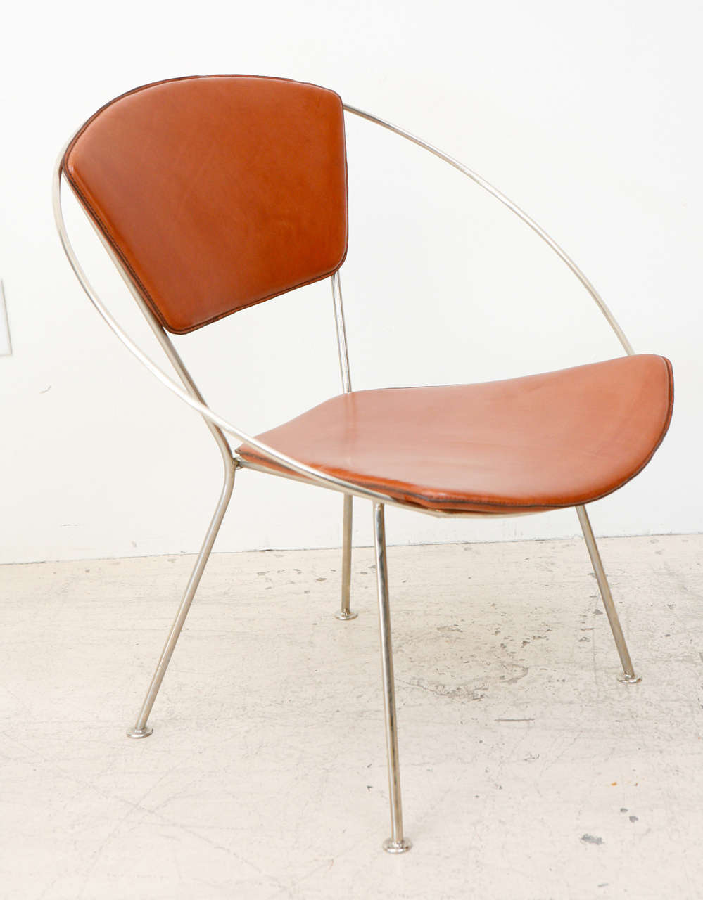 Leather hoop chair by Raymond Loewy for Arvins.