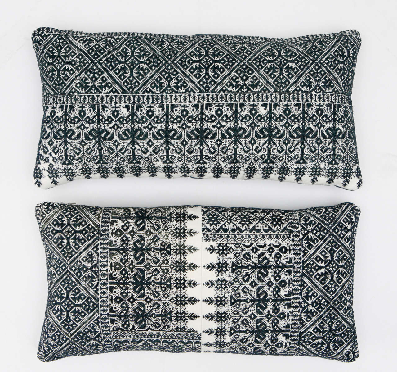 Antique Moroccan textiles from the city of Fez. Intricate all-over silk floss on cotton embroidery produces a durable fabric. Bottom image is made up of two panels sewn in the middel. The designs are based on centuries old Mehindi (henna hand