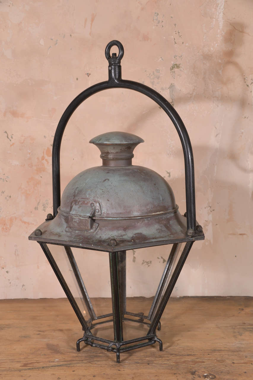 Octagonal lantern in iron and copper. Maker's tag; Claude Lefebvre, Tavers France.