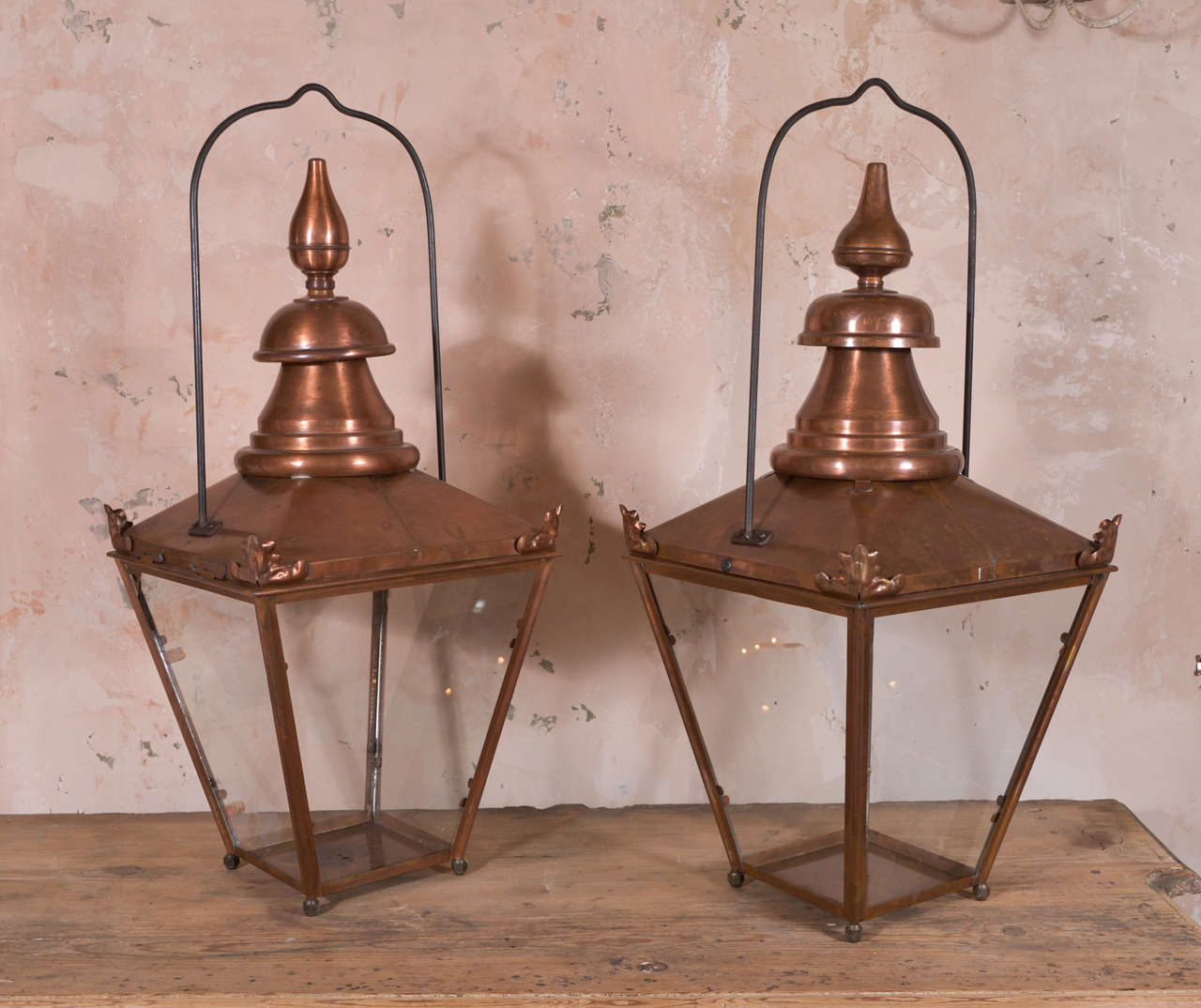 Two French copper lanterns that make a great near-pair (slightly different shaped tops). Lanterns date to the late 19th century. Priced at $3,900 each. Lanterns can be wired for electricity or fitted for use with gas for an additional cost.