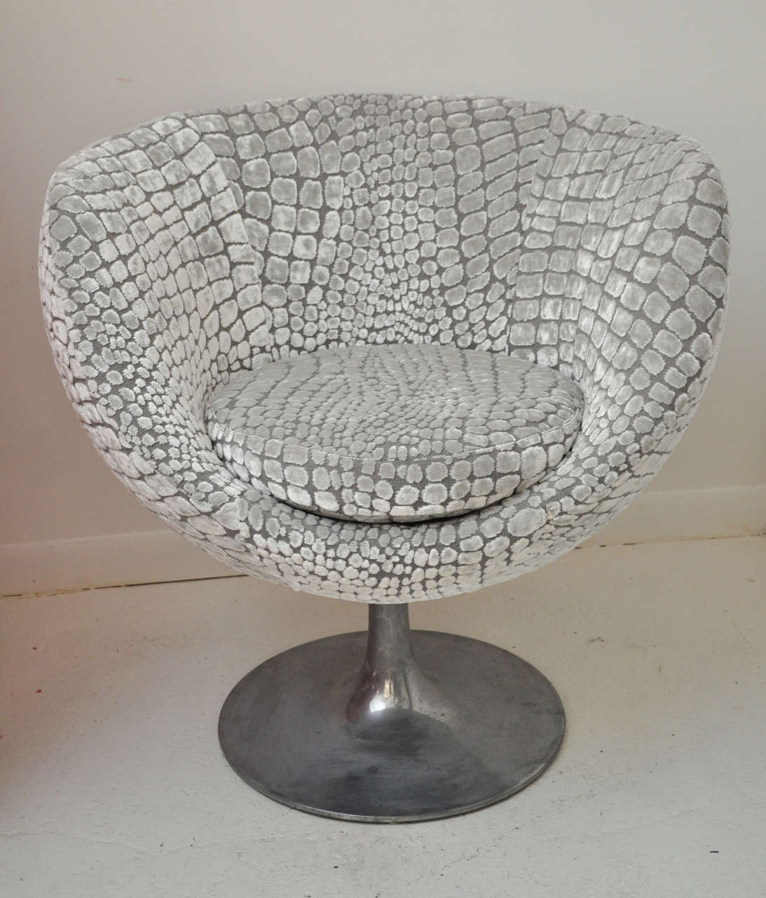 A stylish mid-century swivel tulip chair, recently reupholstered for a modern update!
