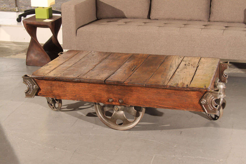 Beautifully aged factory pallet coffee table with stunning industrial details.