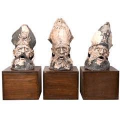 Trio of ceramic bishops heads