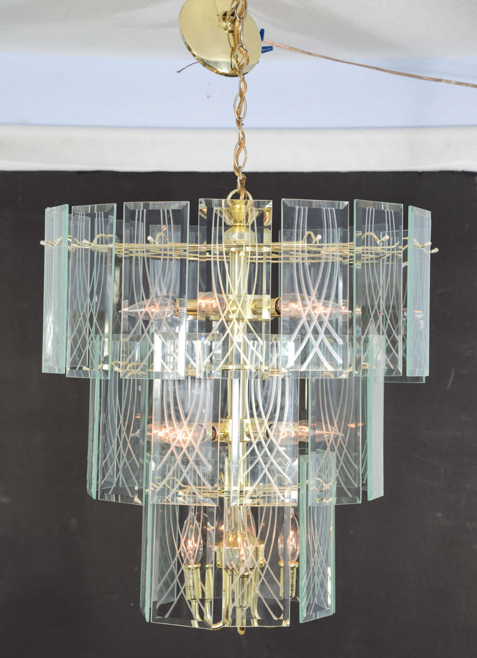 1970s, vintage chandelier, three-tier, cut-glass panels with three levels of light, on a brass frame by Lightolier. Price reduced from $950 to $750.