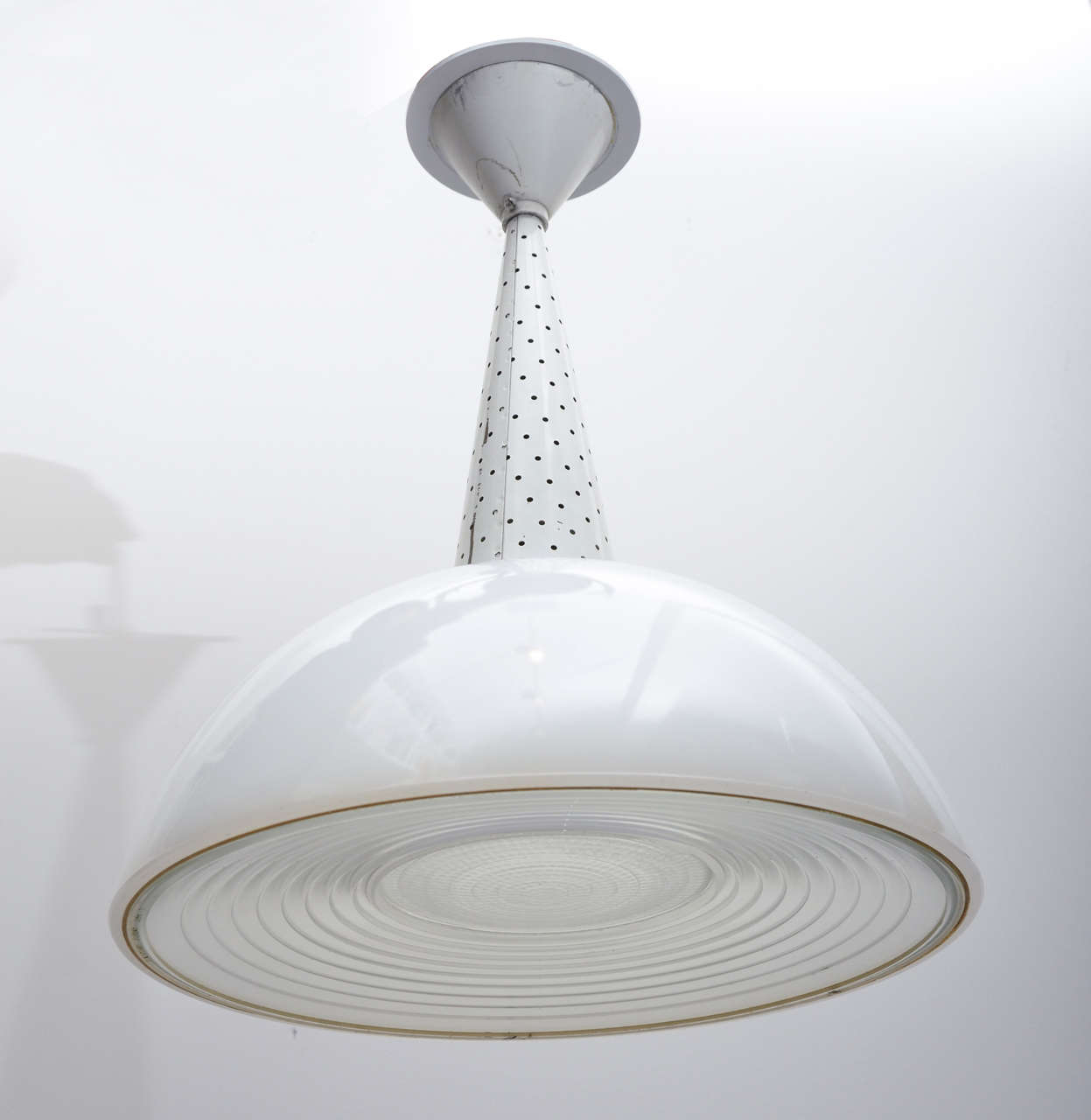 Newly rewired ceiling light fixture in the manner of Matheieu Mategot  - white perforated metal stem with milk glass shade with translucent glass on the bottom - in the center is a removable glass lense.