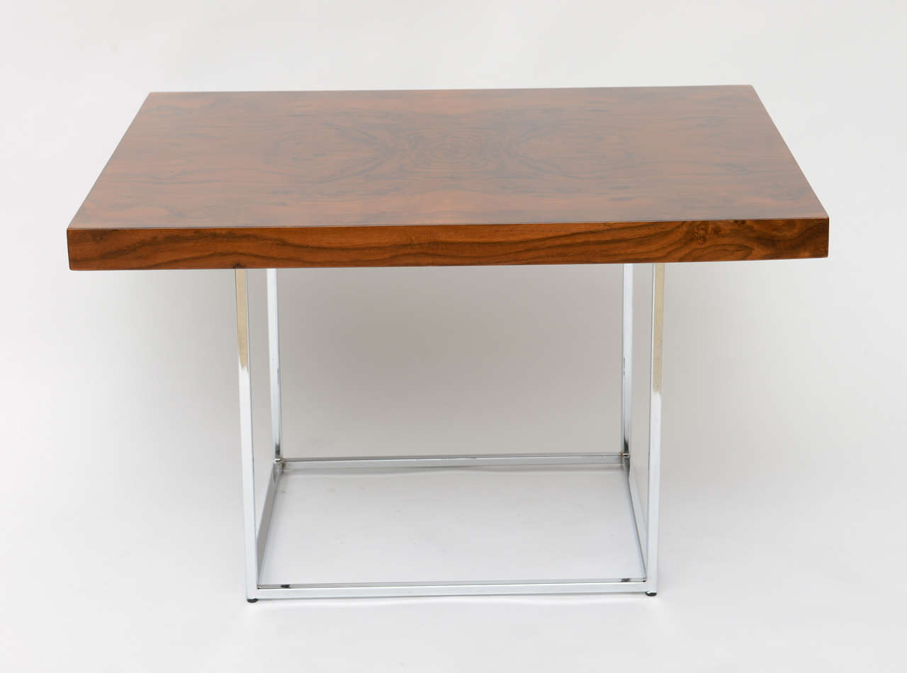 Handsome Milo Baughman side table (or diminutive coffee table) with chromed frame and richly grained rosewood top.