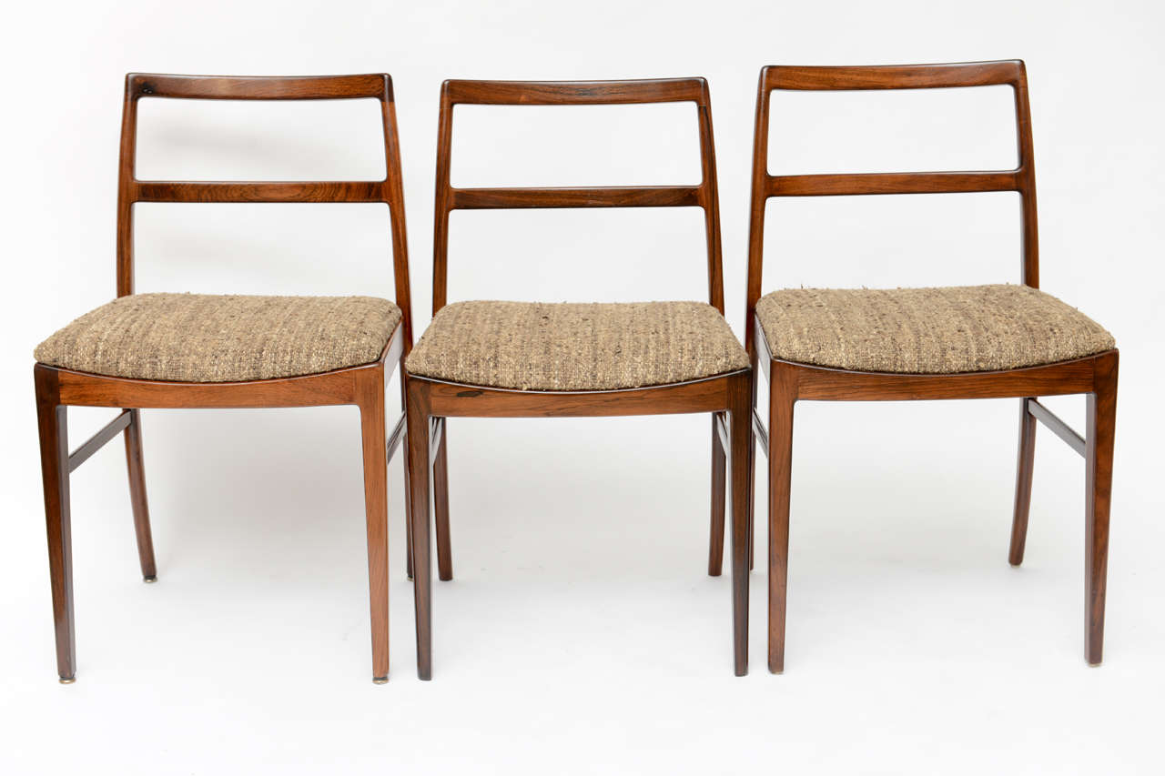 Set of 6 rosewood Ry Furniture dining chairs imported for The George Tanier Collection, circa late 1950's. Beautifully restored and upholstered in a heavy-weight silk tweed.