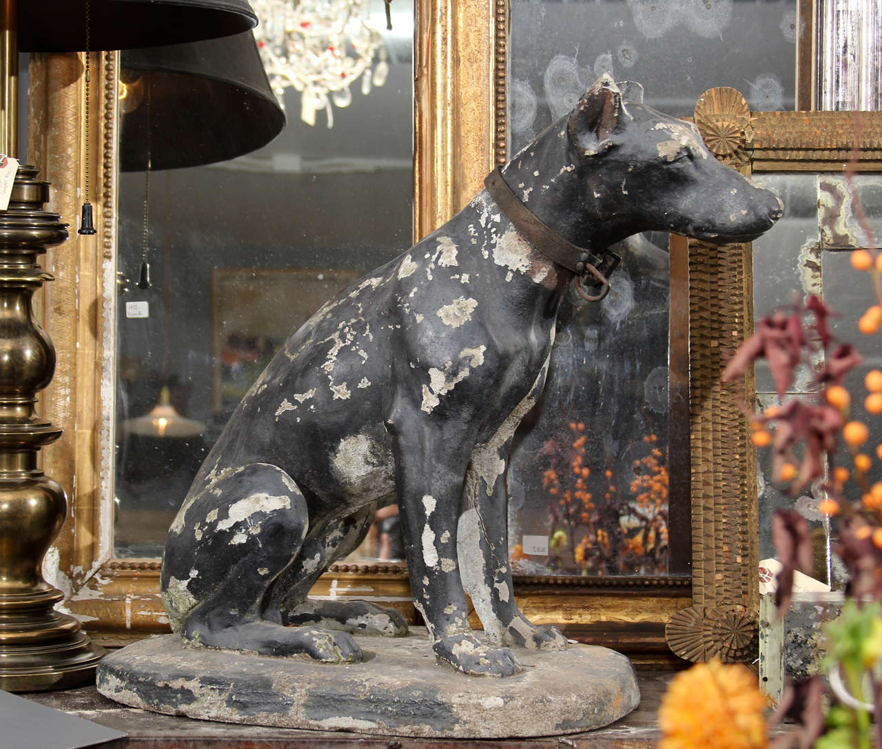 pair concrete dogs with old black paint.  one dog still has his old leather collar.  (these look much better in person- the photos do not do them justice)  great inside by fireplace, or on an entry table..  or outside as intended.