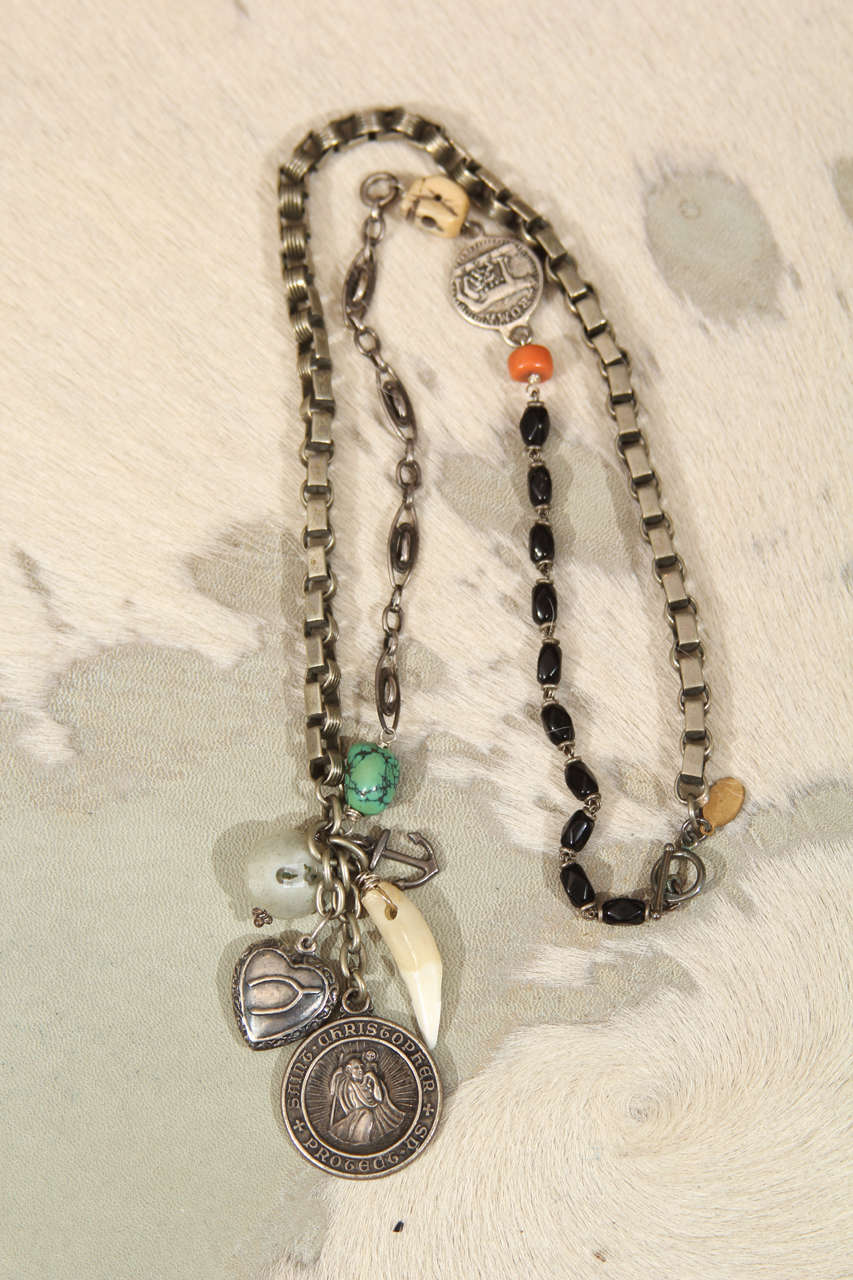 antique pocket watch chain and rosary  with coyote tooth, solar quartz evil eye, tibetan turquoise and coral with sterling luck charms