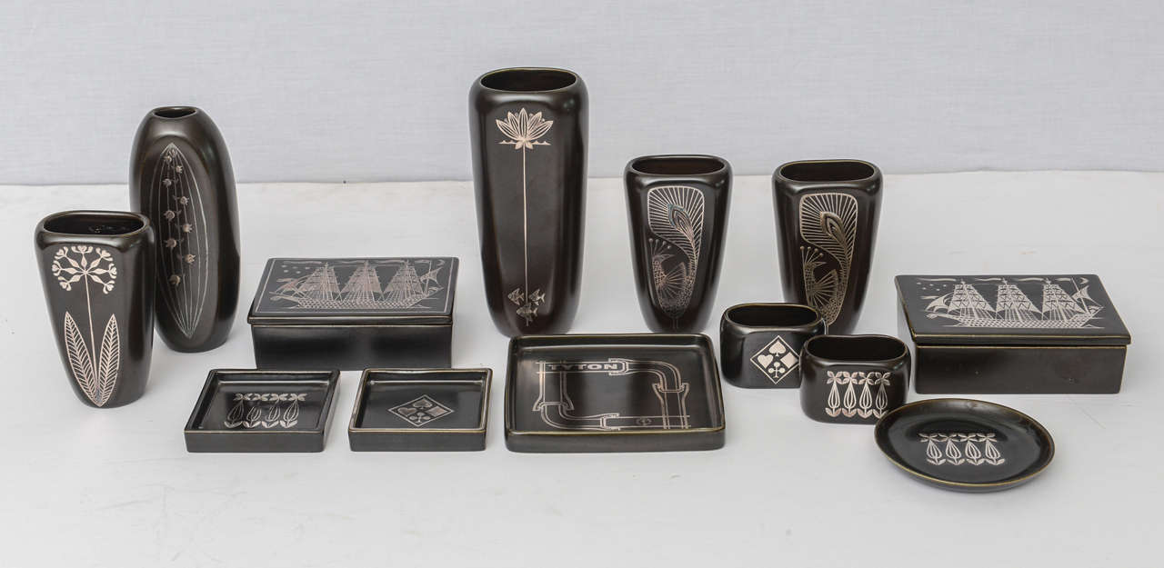 In various vases and vessels, in rare black glaze, markings to underside, priced individually, see dealer.

Pieces can be sold individually or in smaller groups, please contact dealer for pricing.
