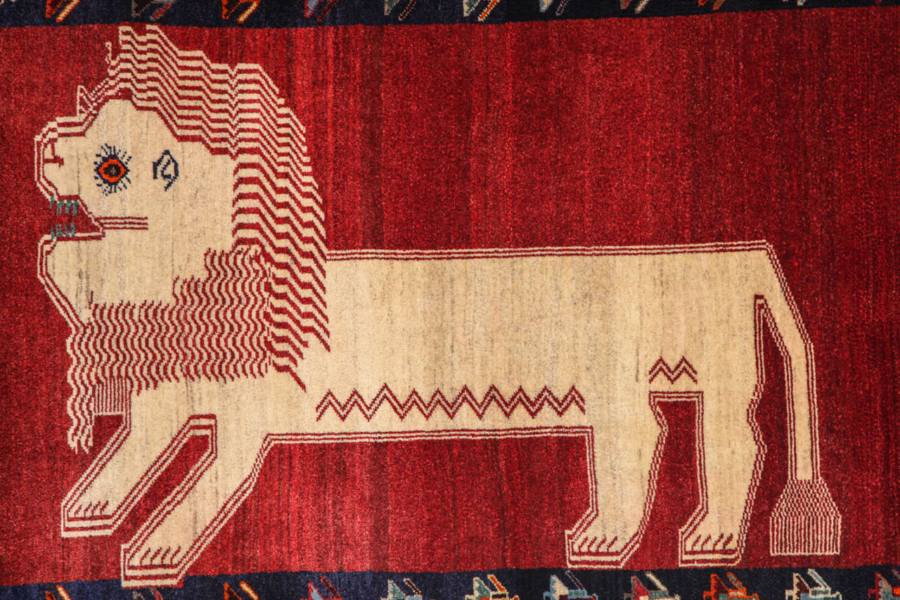Persian Vintage Qashqai Animal Rug, Red, Wool, Circa 1940s, 4’ x 6’ For Sale