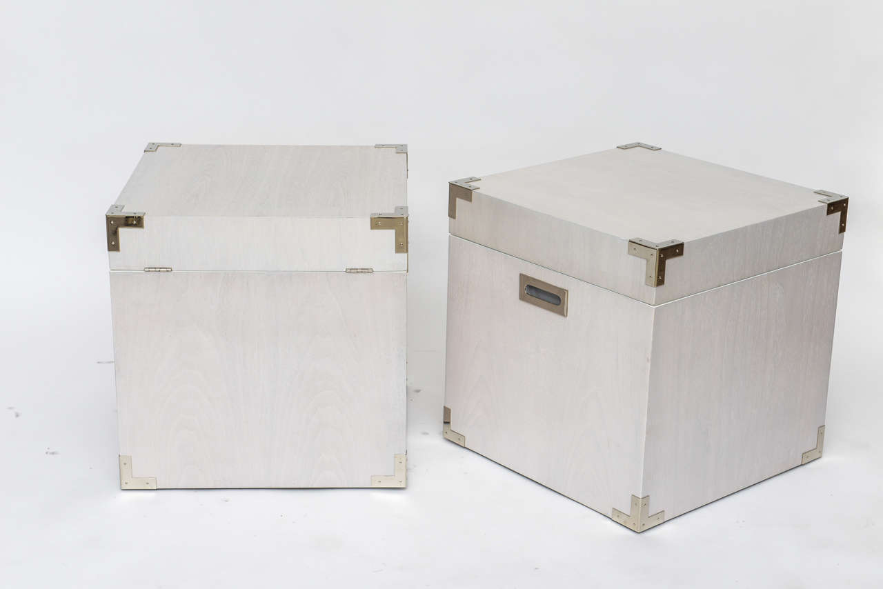 Pearly tones of white and grey make this pair of 1970s Campaign chests as gorgeous as they are practical. Bleached and white-washed walnut with nickeled hardware and grey interiors. Please ask for additional close-up photos to appreciate the subtle