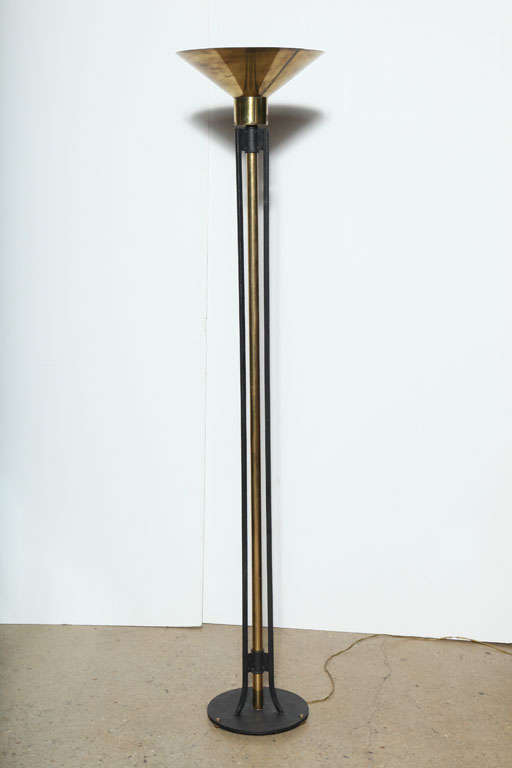 Tall, 1970's Hollywood Regency Hart Associates Up Light, Floor Lamp.  Featuring three vertical Black Iron supports, accenting a cylindrical Brass Central column, wide conical Brass shade, round Black Iron base with Brass footed details. Sturdy.