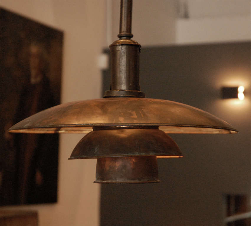 a perfectly patinated copper ceiling fixture from poul henningsen. accurate patent number to fixture.