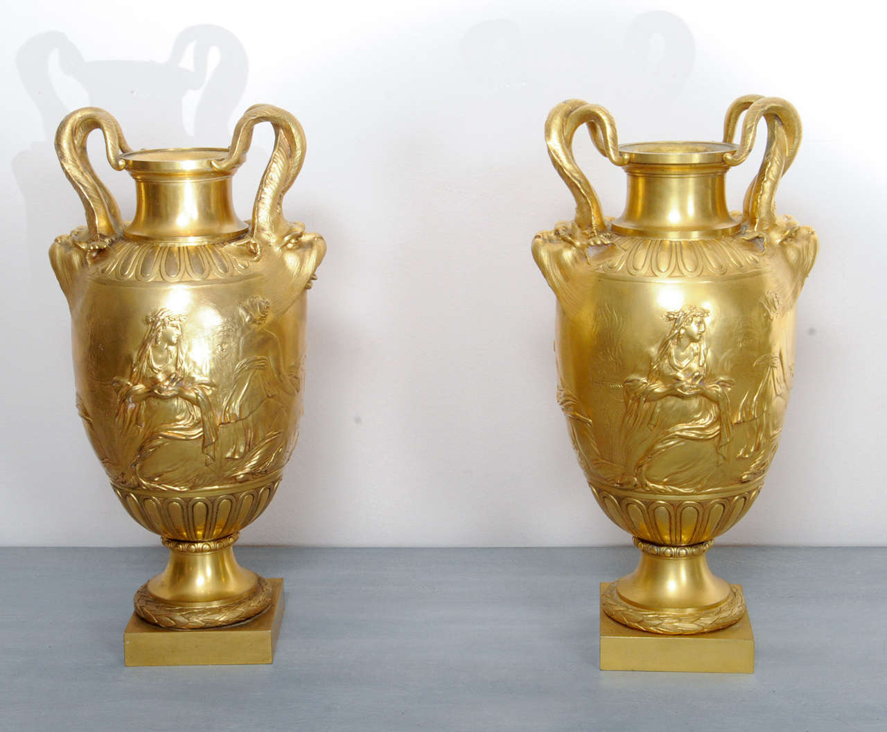 a Pair of Ormolu Ornamental Vases after Clodion and made by Ferdinant Barbedienne, Paris.