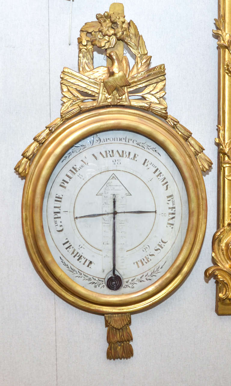 Barometer /thermometer Louis XVI period - wood gild with real gold leave.