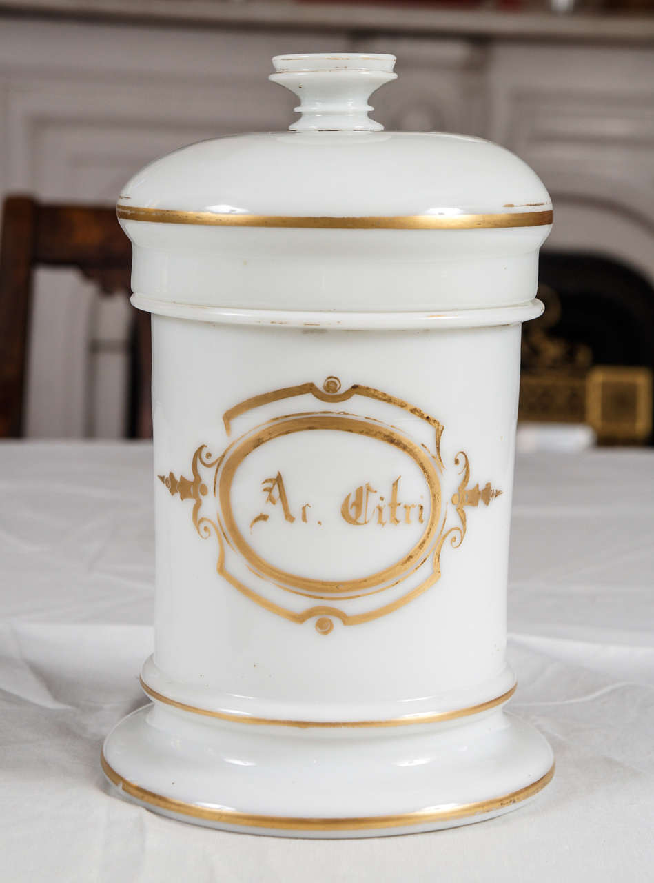 Large French white opaline lidded apothecary jar with gold decoration 