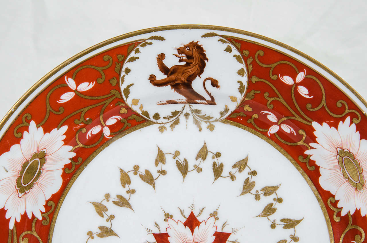 A pair of Chamberlain's Worcester armorial crested dishes with a lion rampant crest and orange blossom borders ( We have two pairs).
The orange border is decorated with orange blossoms and gilded vines. Chamberlain's Worcester were 