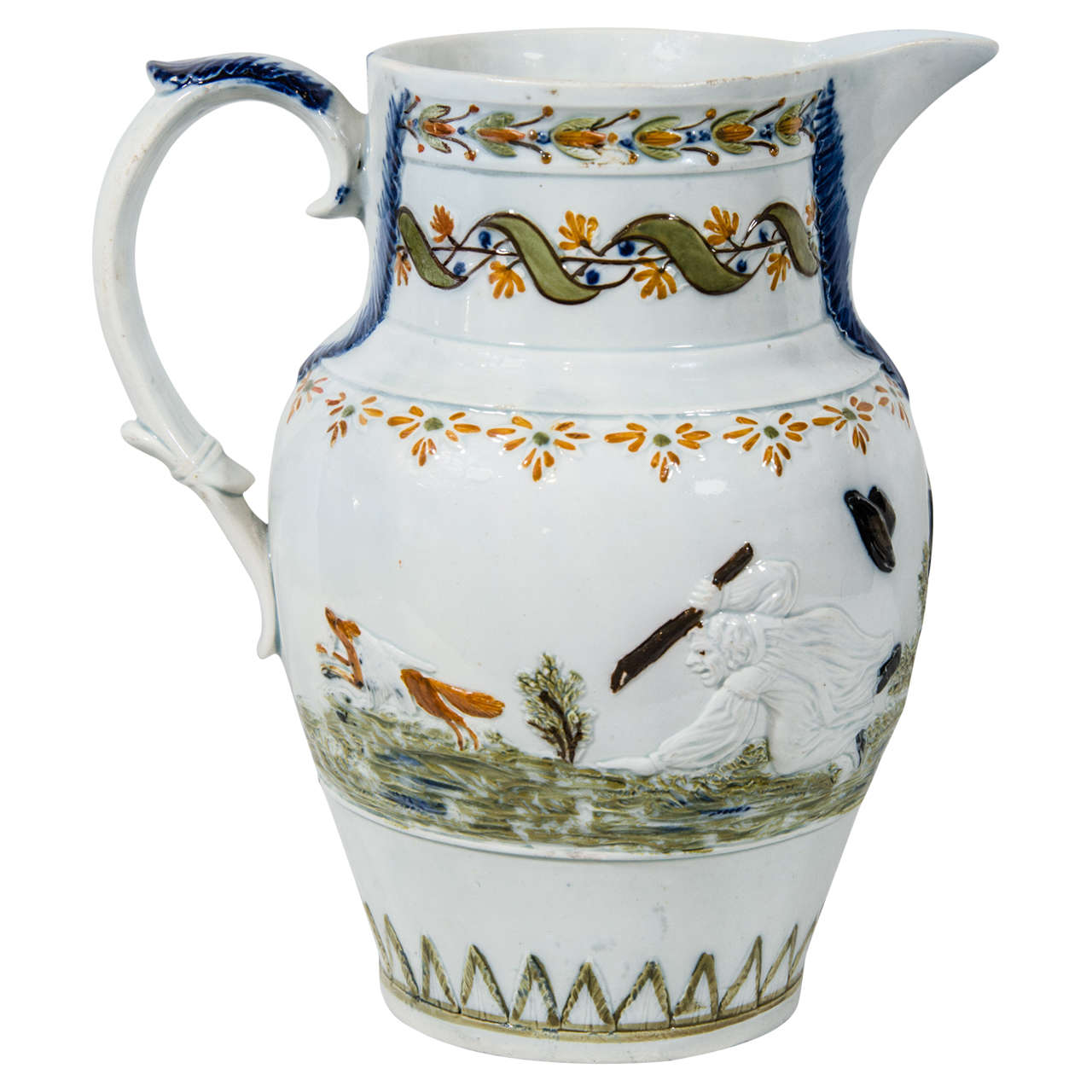 A Prattware jug telling the tale of the old nursery rhyme, “The Fox and The Goose,”. On one side it shows “Old Mother Slipper Slopper unleashing a savage dog, while John stands agape, pitchfork in hand'. The other side of the jug depicts the farmer