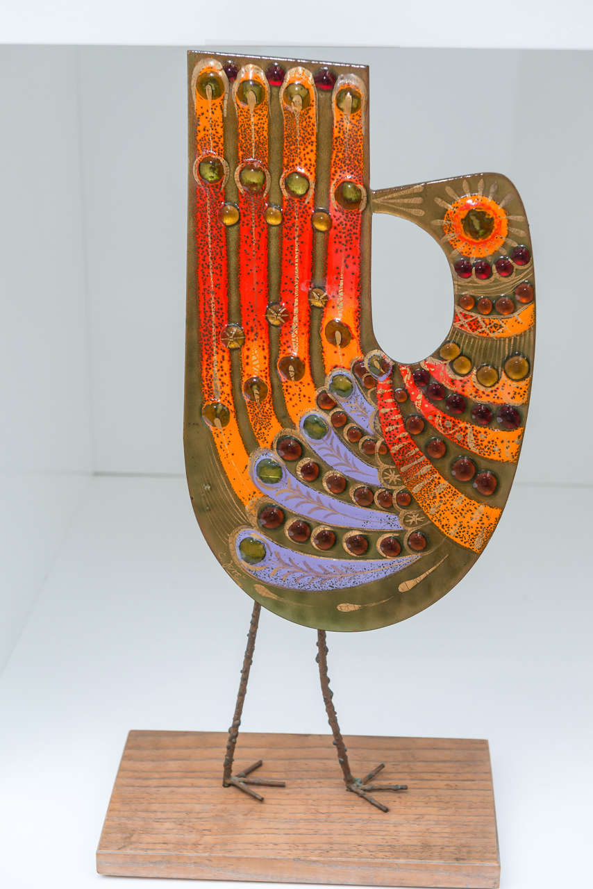 Stylized enamel peacock sculpture by Curtis Jere.