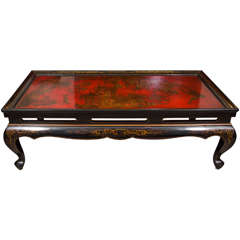 A Chinoiserie Red Lacquer Coffee Table