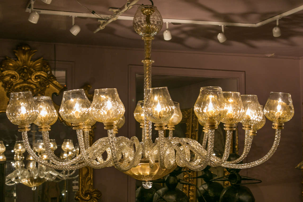 Murano glass chandelier, 16 arms ending by a tulip shape globe.