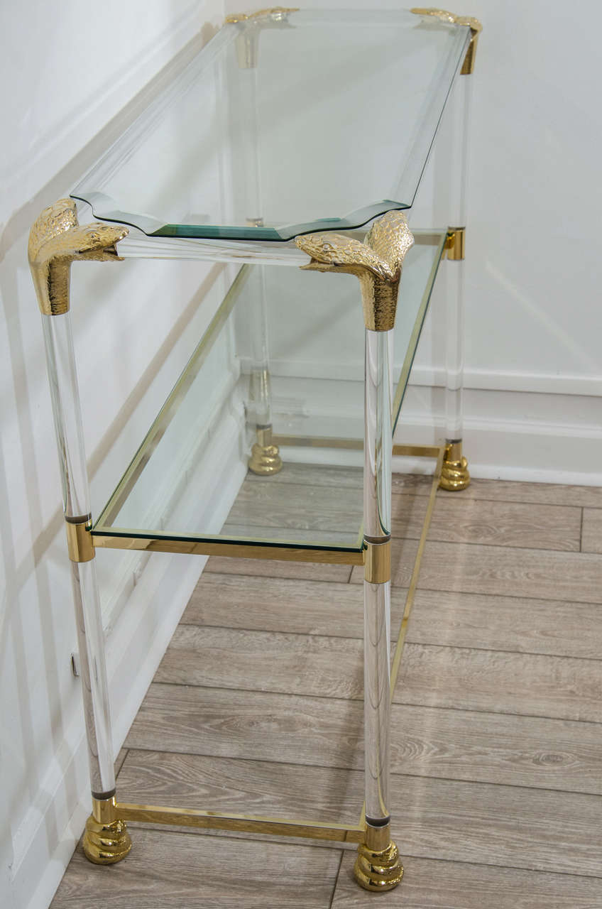 Mid-20th Century Lucite and Brass Étagère Featuring Snake Head Details