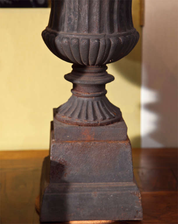 Set of Four Cast Iron Urns 1