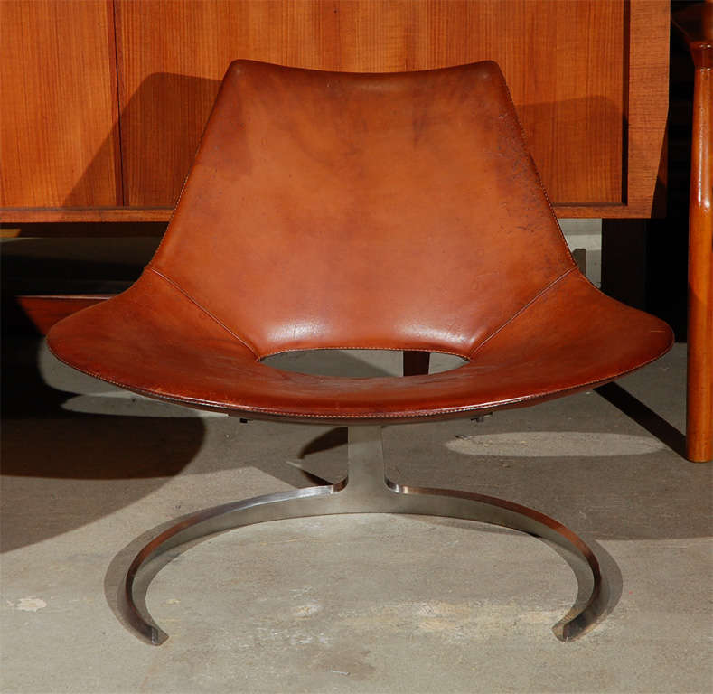 Pair of brown leather & stainless steel chairs designed by Preben Fabricius & Jorgen Kastholm
SOLD TO MARTHA ANGUS