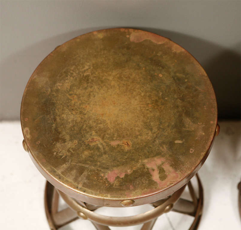 Pair of brass side tables or stools.  Priced individually at $365.