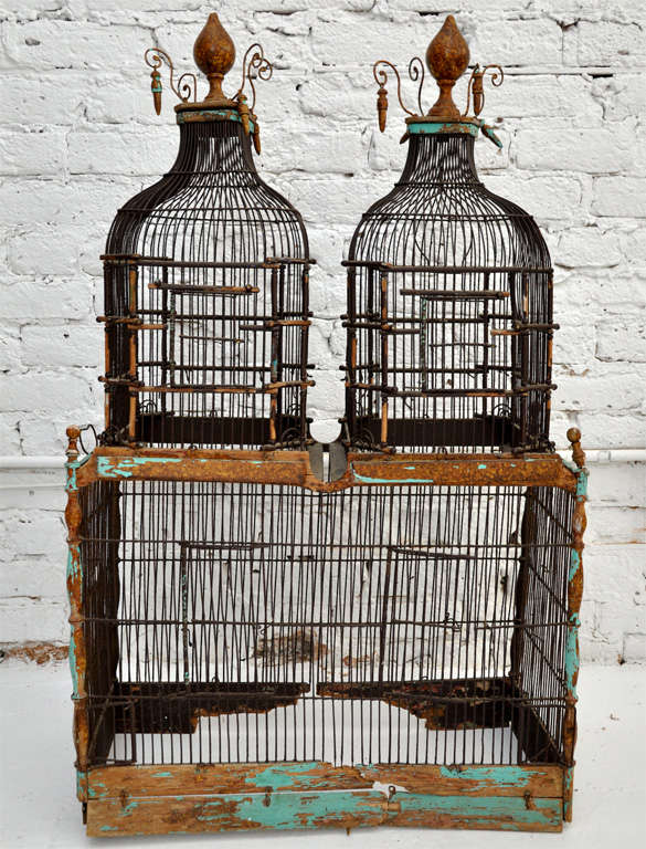 Vintage metal and wood birdcage.  Item does not include bottom of birdcage