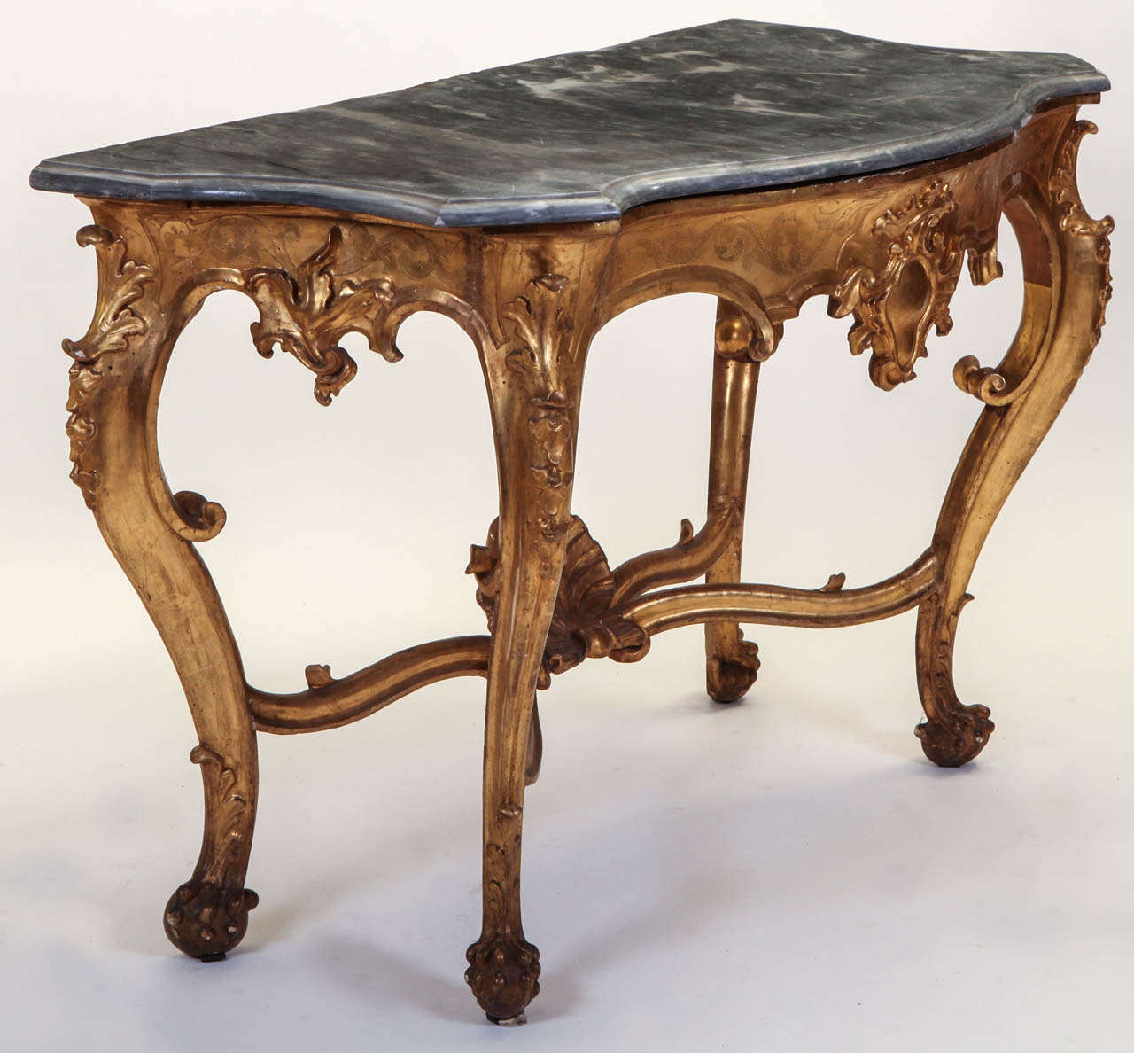 A fine Italian, 19th century, giltwood console table with a grey veneered marble top.