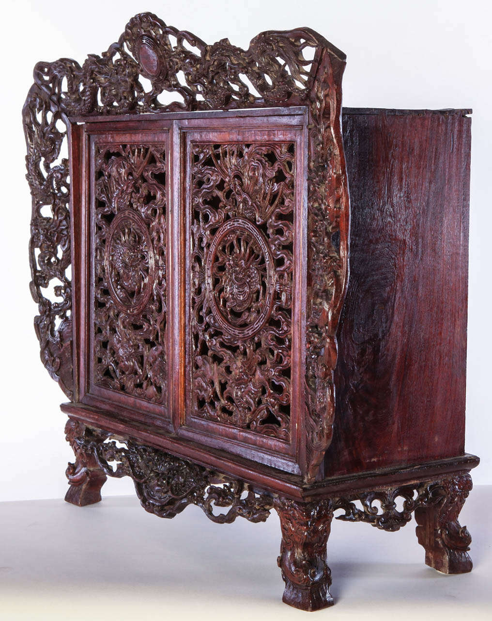 A Chinese  small openwork wood cabinet depicting Dragons For Sale 3