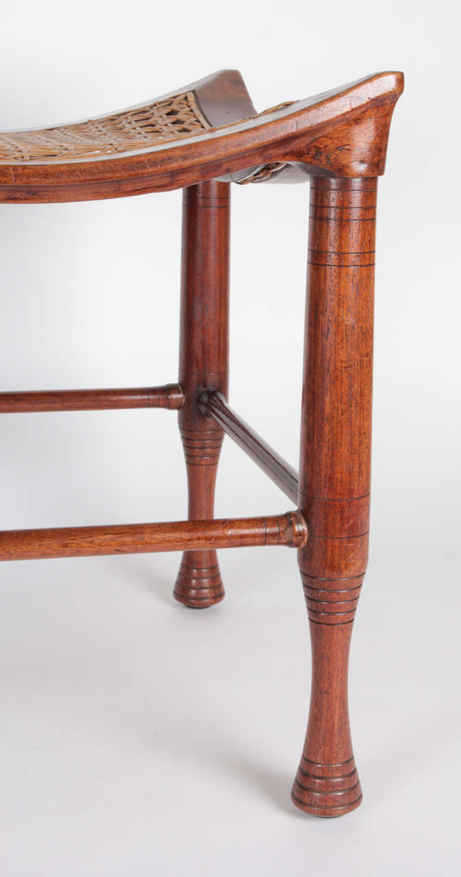 Liberty & Co. / Leonard Wyburd Egyptian Revival Four-Legged Mahogany Thebes Stool Circa 1890-95 In Excellent Condition For Sale In New York, NY